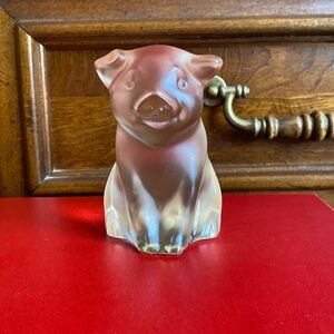 Lalique pig figures.